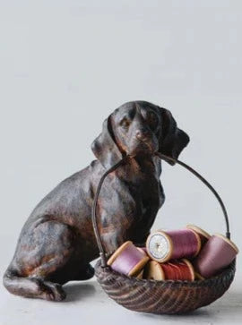 resin dog with basket