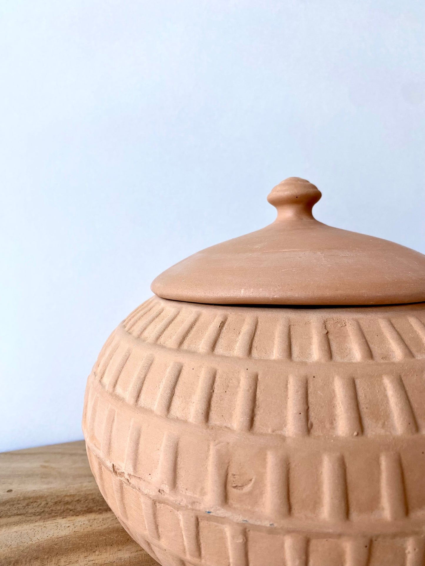 handmade terracotta pot with lid
