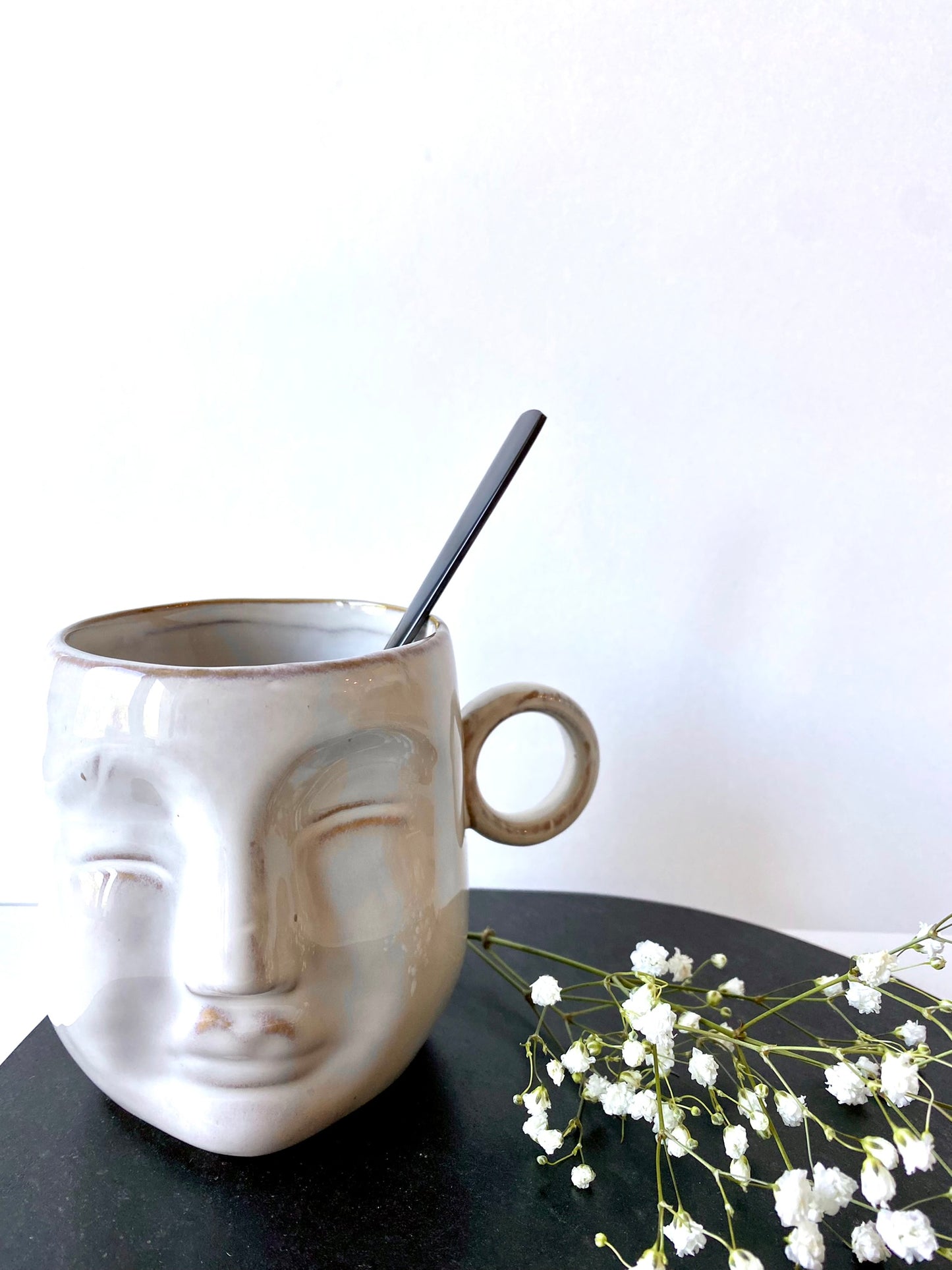 cream stoneware face mug