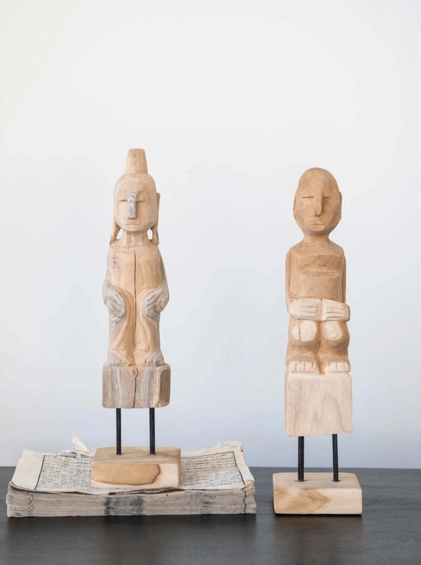 hand-carved teakwood figure
