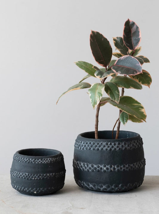 small black planter with raised dots