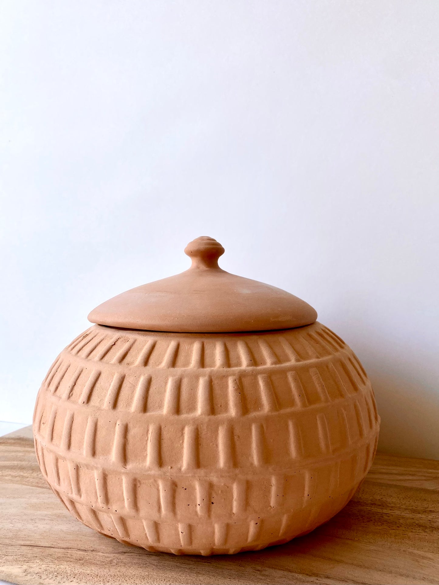 handmade terracotta pot with lid