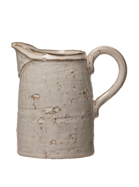 stoneware pitcher with glaze