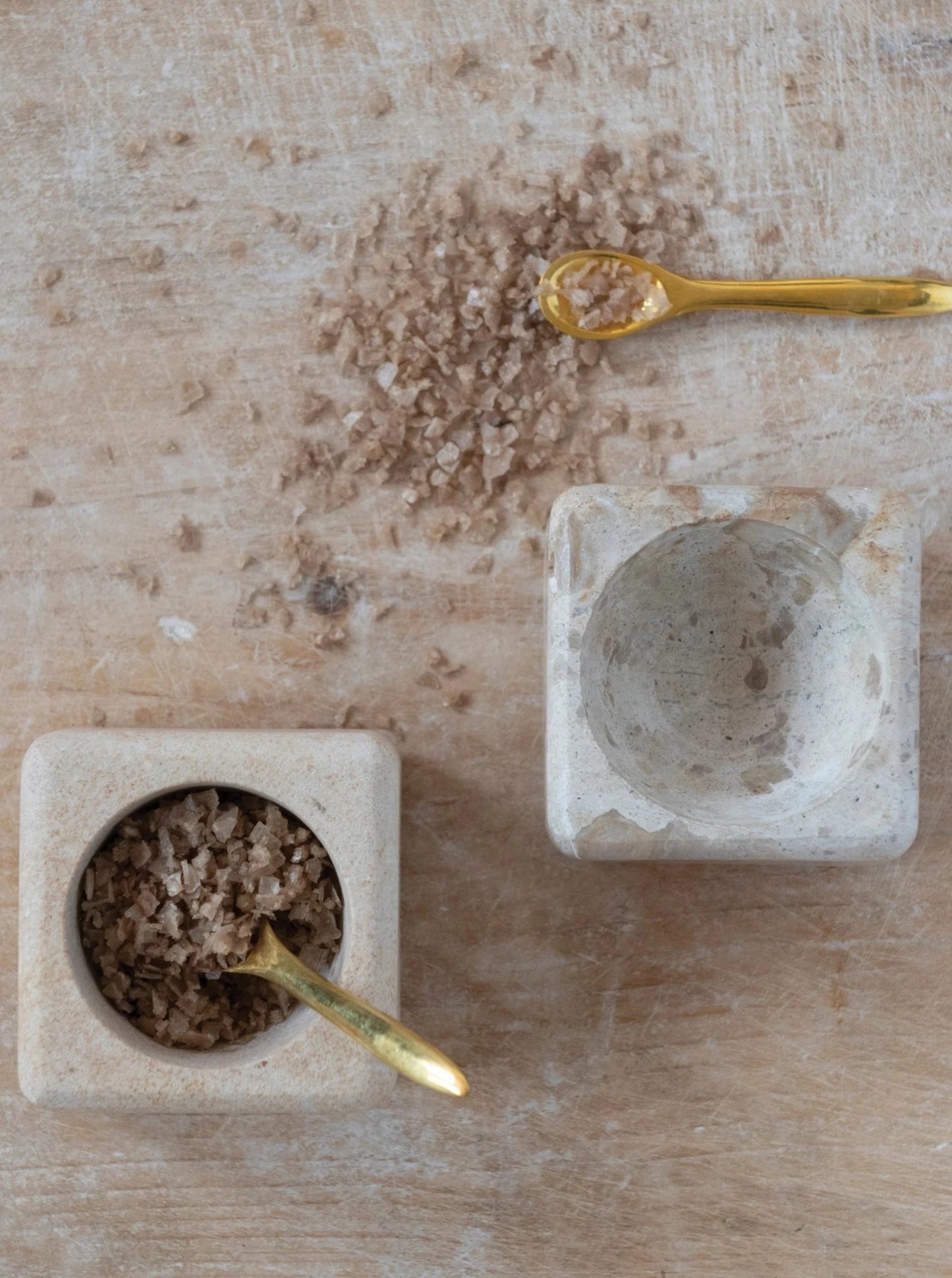 set of 2 marble/sandstone pinch pots with brass spoon